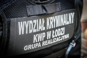Kamizelka taktyczna z napisem: Wydział Kryminalny KWP w Łodzi grupa realizacyjna
